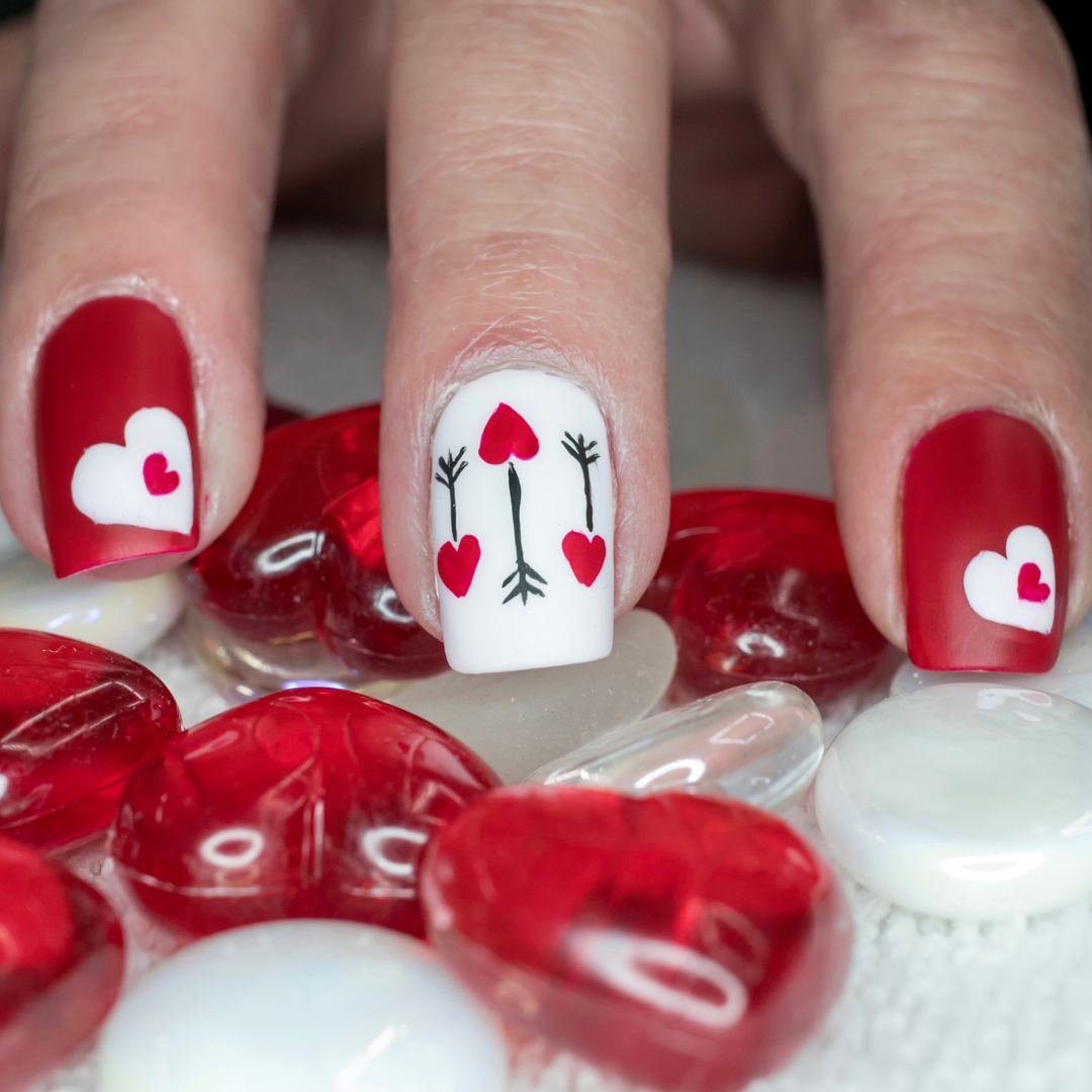 Negative Space Hearts for Valentine's Day nail ideas